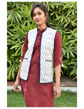 Reversible quilted jacket in blue and white ikat - button