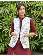 Reversible quilted jacket in blue and white ikat - pockets