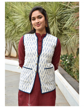 Reversible quilted jacket in blue and white ikat - sleeveless
