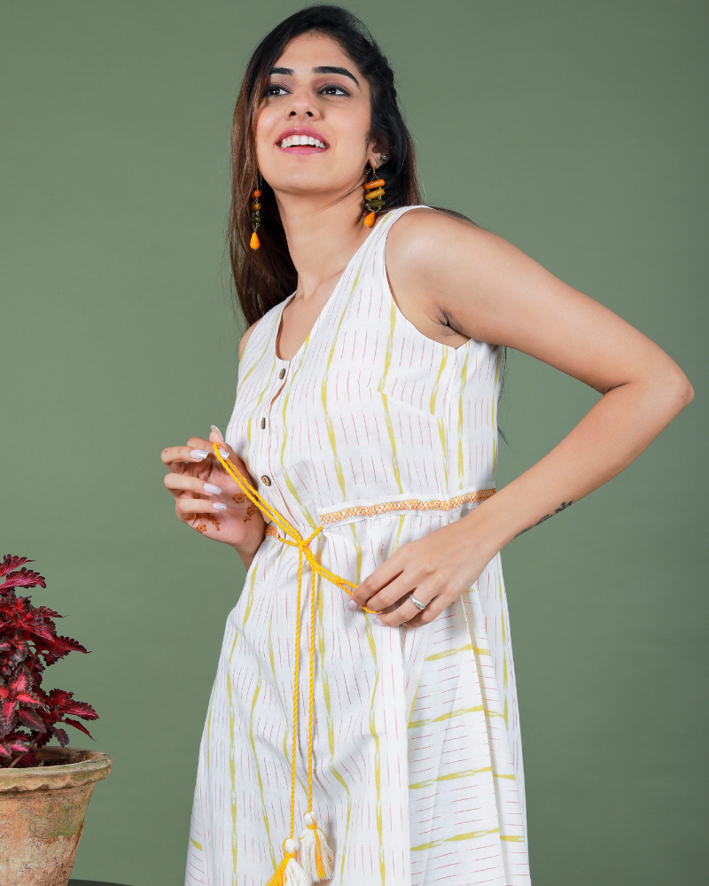 Sleeveless white ikat dress with embroidered belt