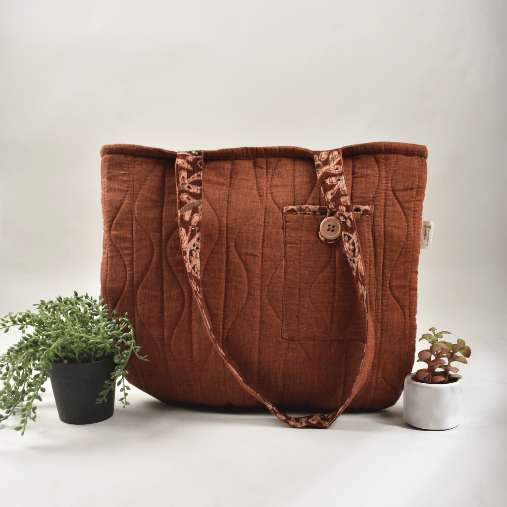 Rust colour quilted flat bag-front