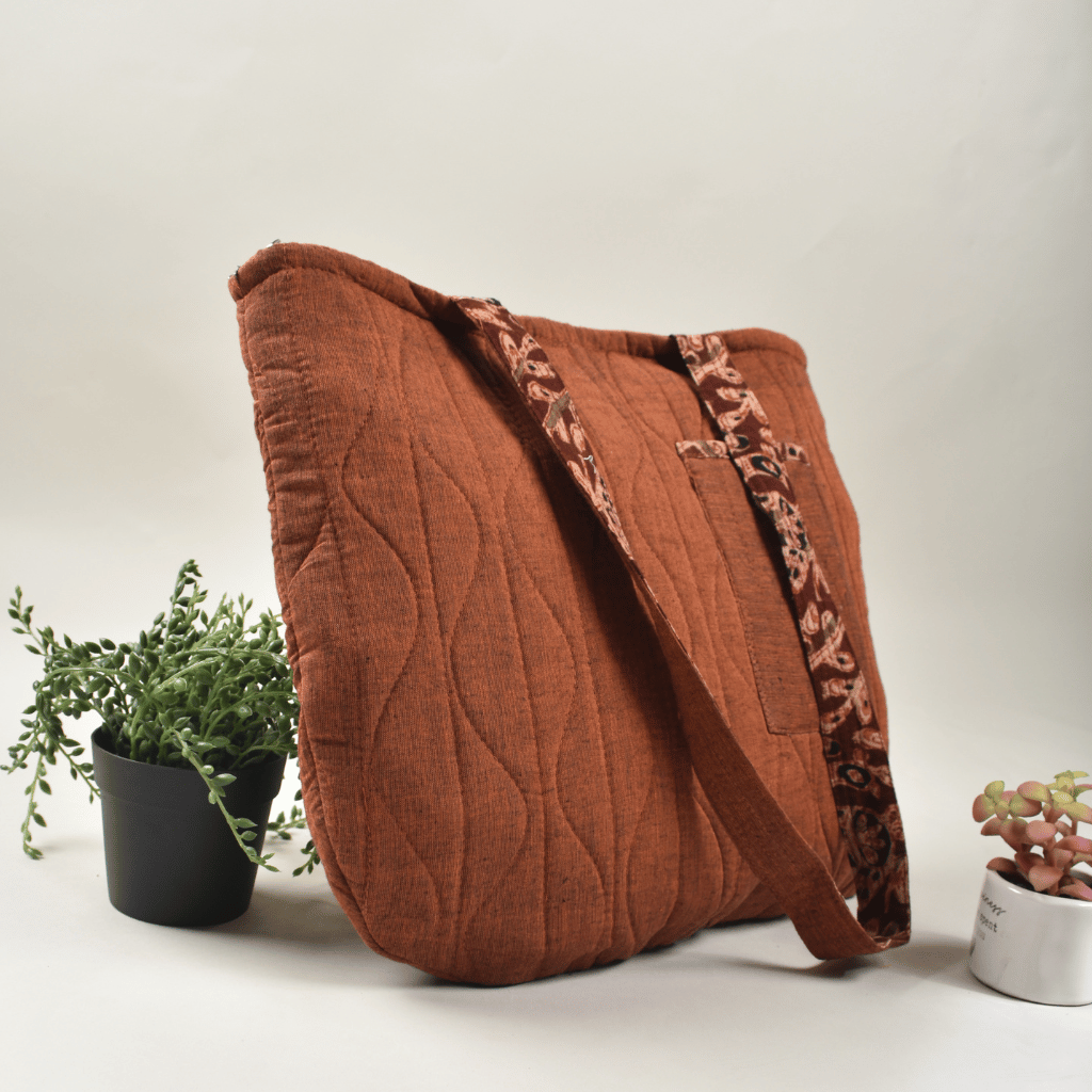 Rust colour quilted flat bag-side