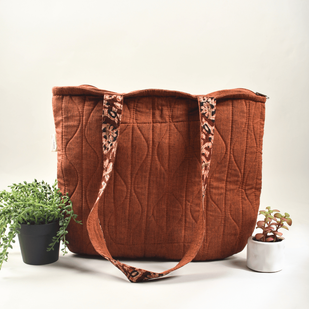 Rust colour quilted flat bag-back