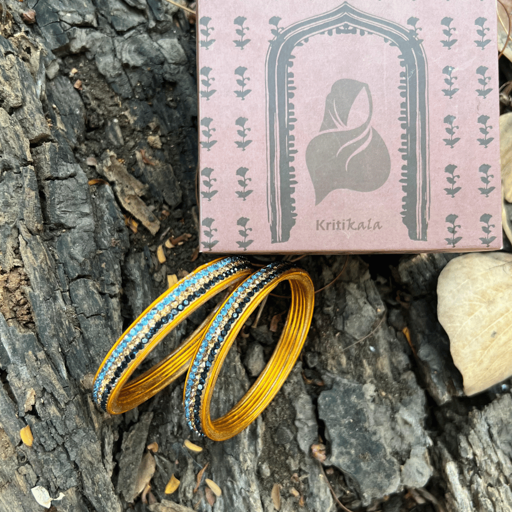 Pair of traditional lac bangles in blue and black tones