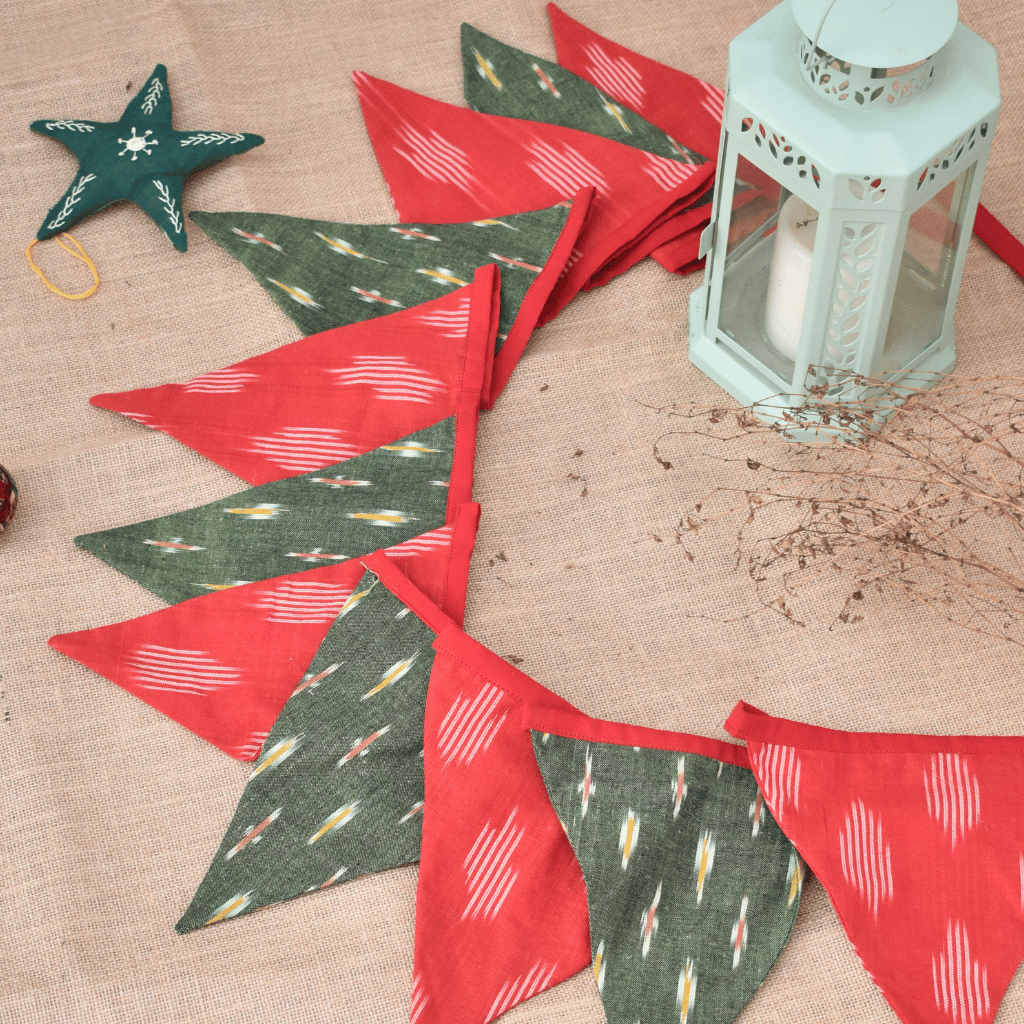 Fabric christmas bunting in red and green ikat