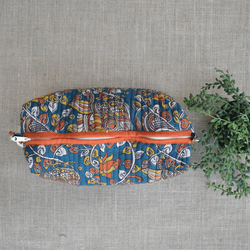 Orange quilted travel pouch