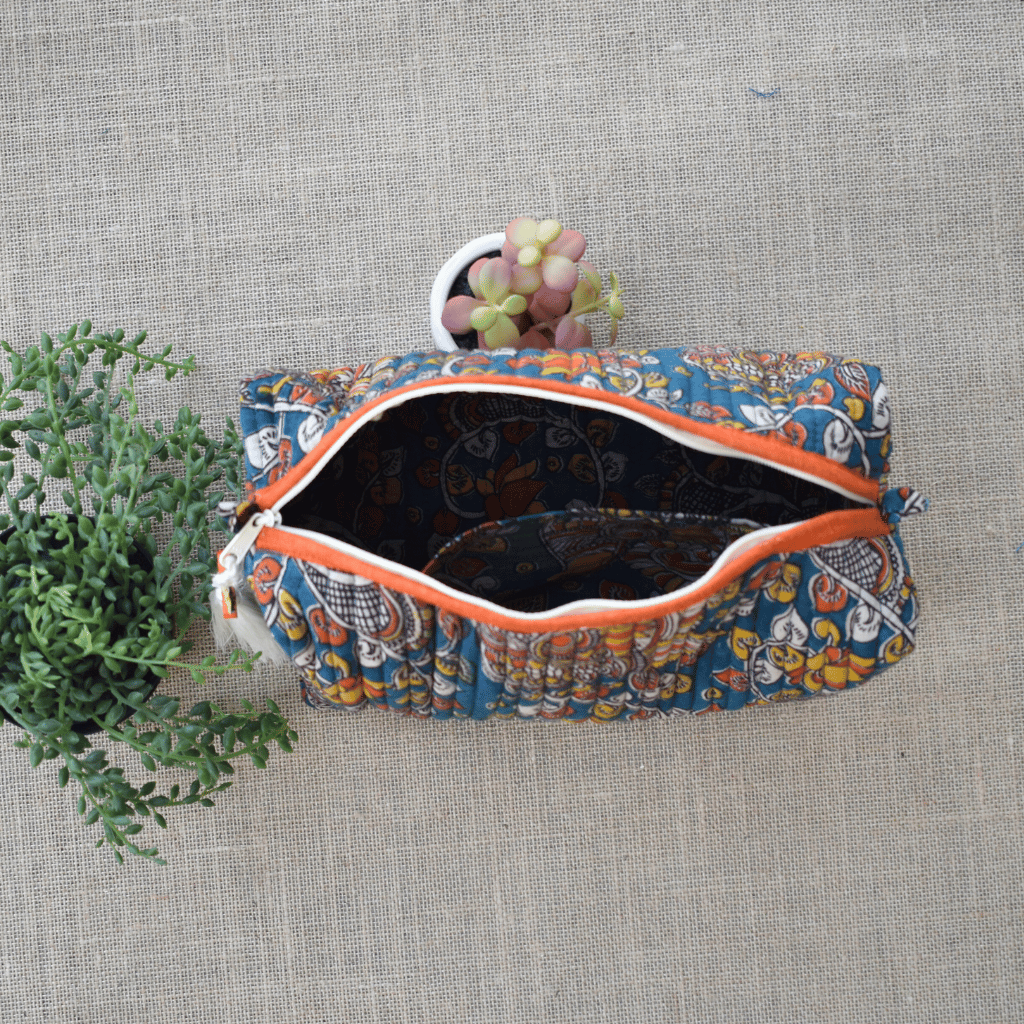 Orange quilted travel pouch