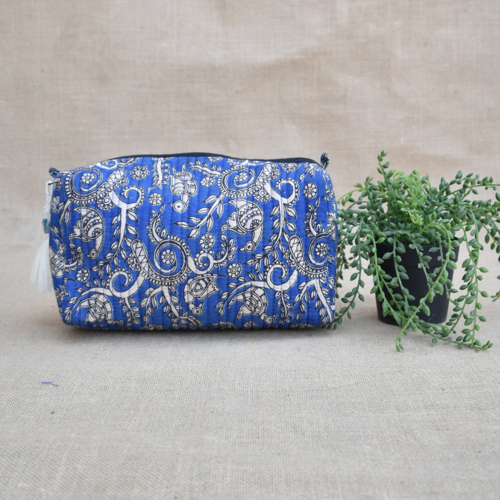 Blue quilted travel pouch