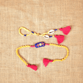 Handcrafted Bhai Bhabhi Rakhi Set with Cotton Potli, Kumkum & Rice - Blue