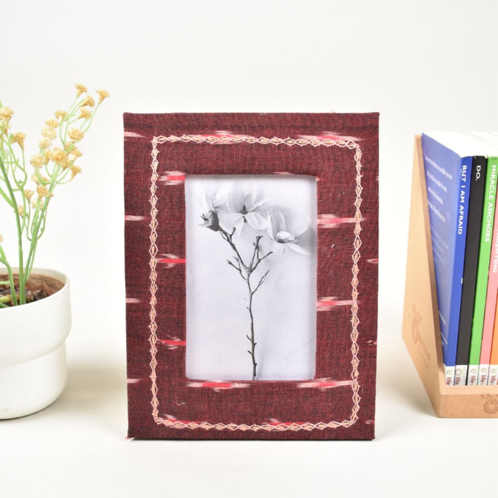 Photo frame for 4" x 6" photo with embroidered fabric covering