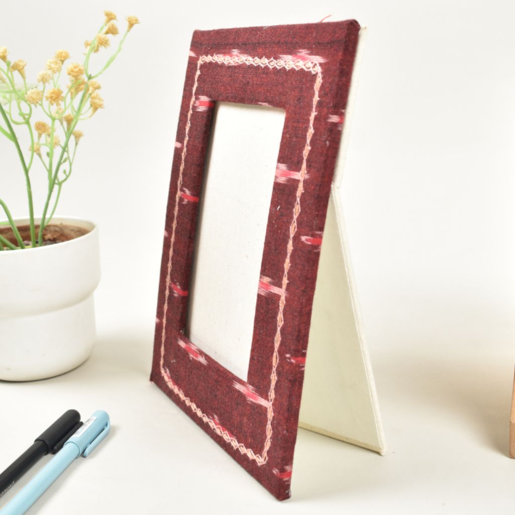 Handmade paper photo frame with maroon fabric covering (6" x 4")