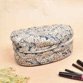 Fabric vanity kit or blue quilted toiletry case in kalamkari cotton - front