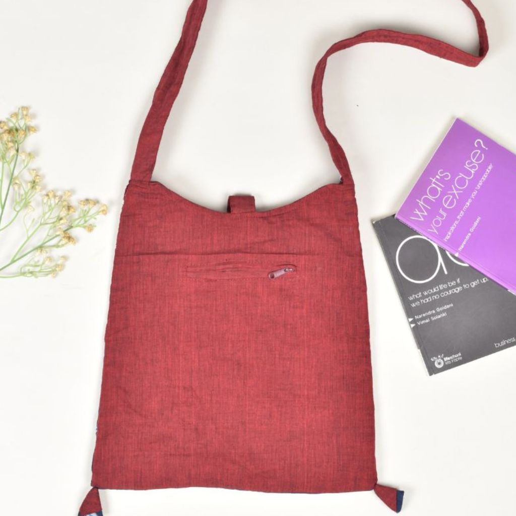Maroon and Blue Ikat sling bag with hand embroidery