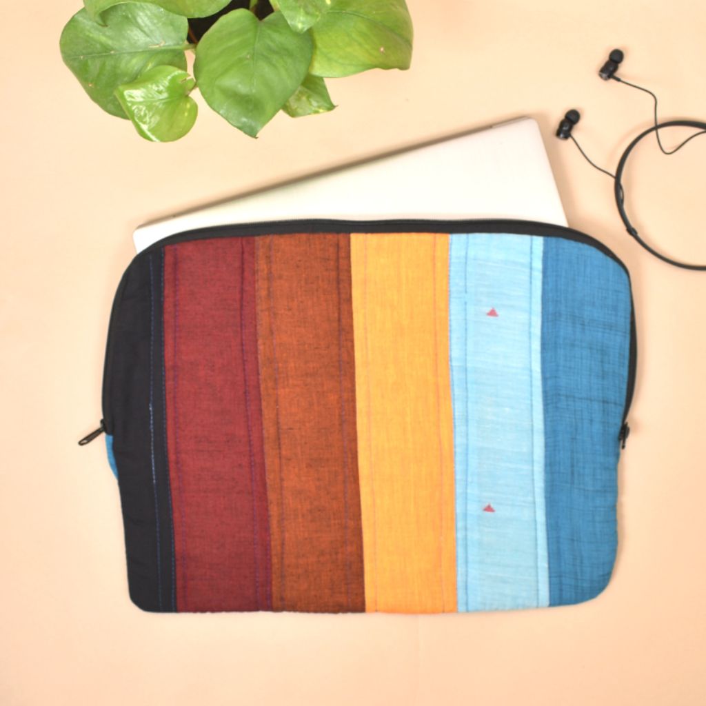 Brightly coloured laptop sleeve with zip closure