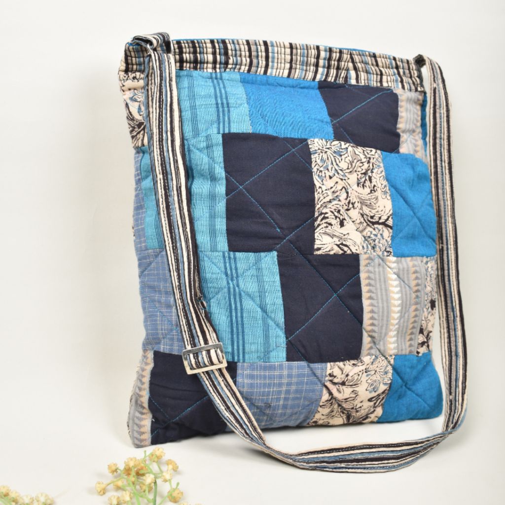 Patchwork sling bag in blue cotton  with top zip closure