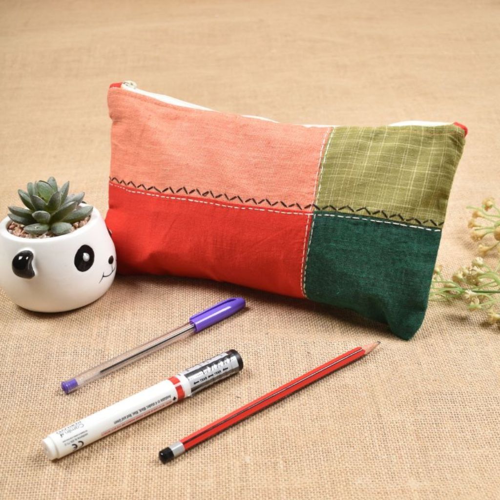 Red and green pencil pouch with pockets inside