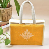 Yellow and white jute lunch bag with traditional motif - handle